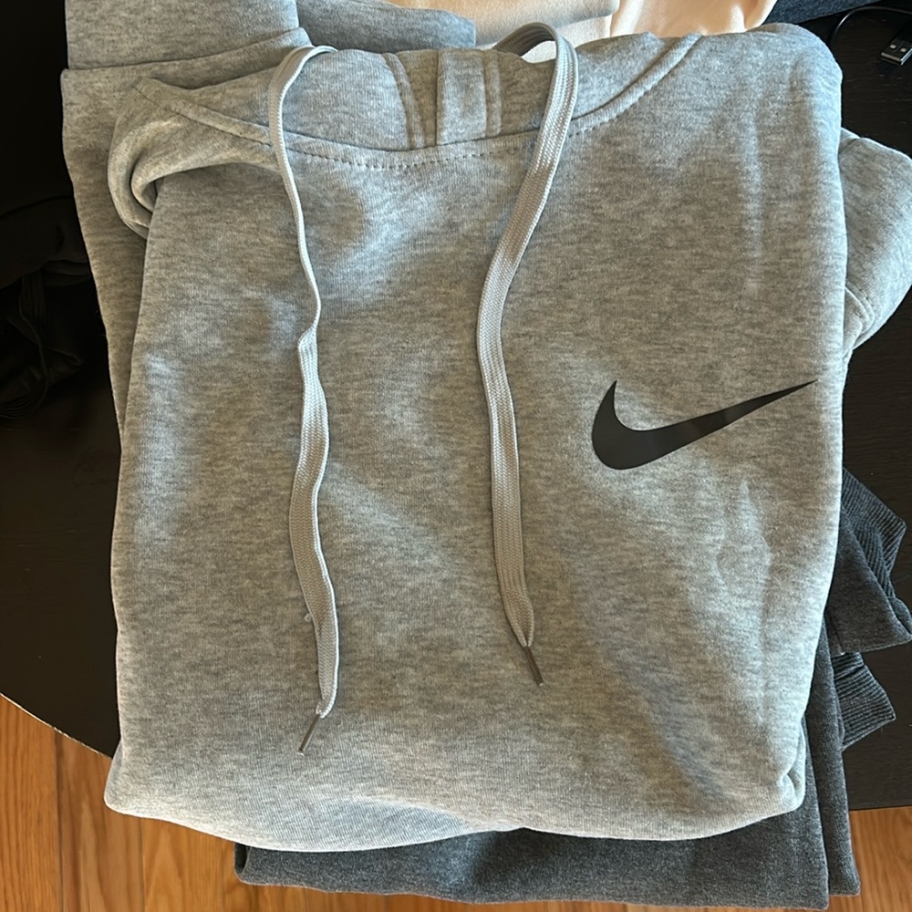 Grey nike hoodie,  never been worn